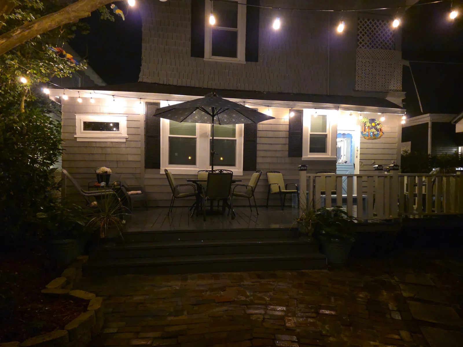 Lighted back deck with outdoor dining furniture